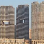 Зачем в Гонконге строят здания с отверстиями